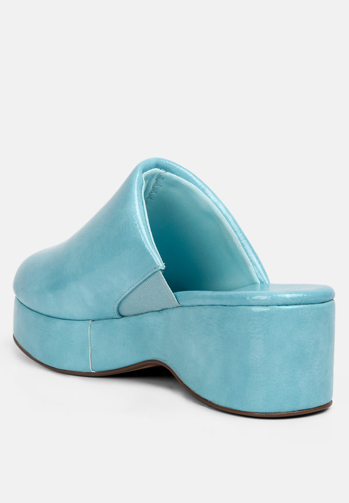 women olori solid platform slip on mules#color_blue