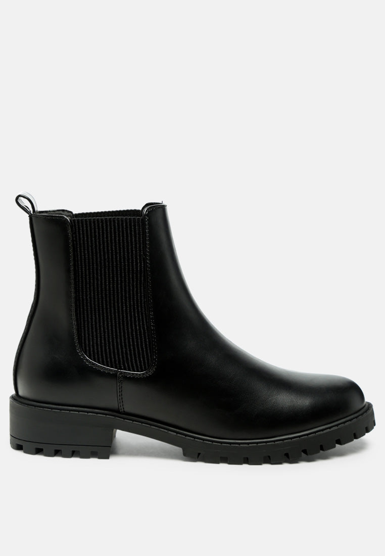 women chelsea styled ankle boots in black#color_black