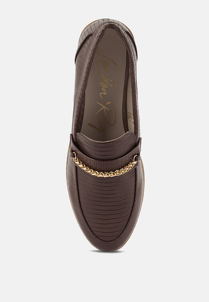 women low block loafers adorned with golden chain#color_brown