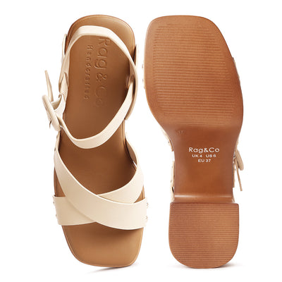 cross strap embellished heels#color_beige